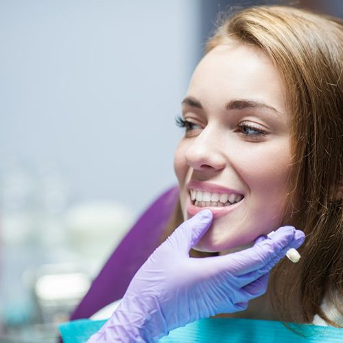 a patient undergoing the one-visit dental crown process