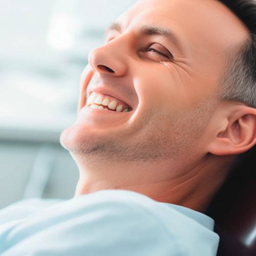 a patient smiling comfortably after root canal treatment